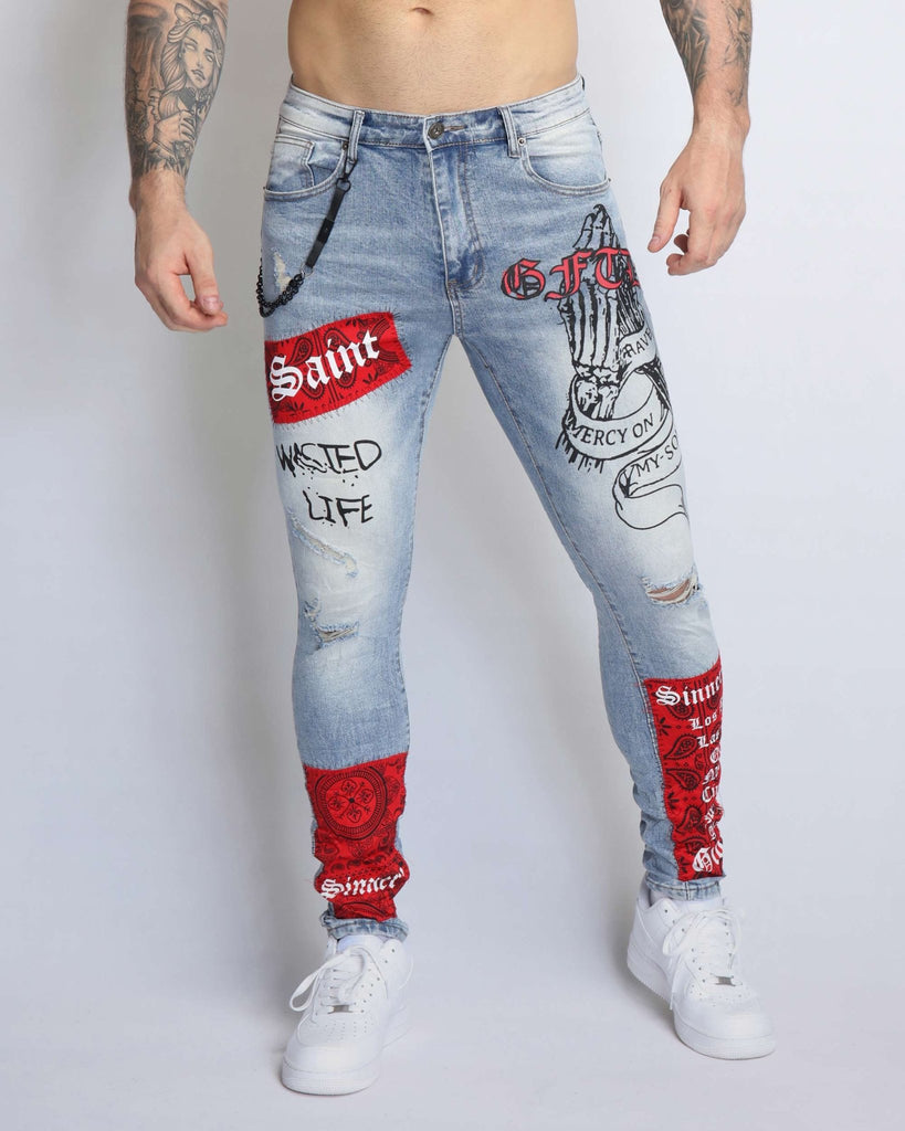 Graffiti Ripped Blue Jeans with Red Patches and Cashew Flower Elements - WorkPlayTravel Store